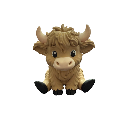SITTING HIGHLAND COW